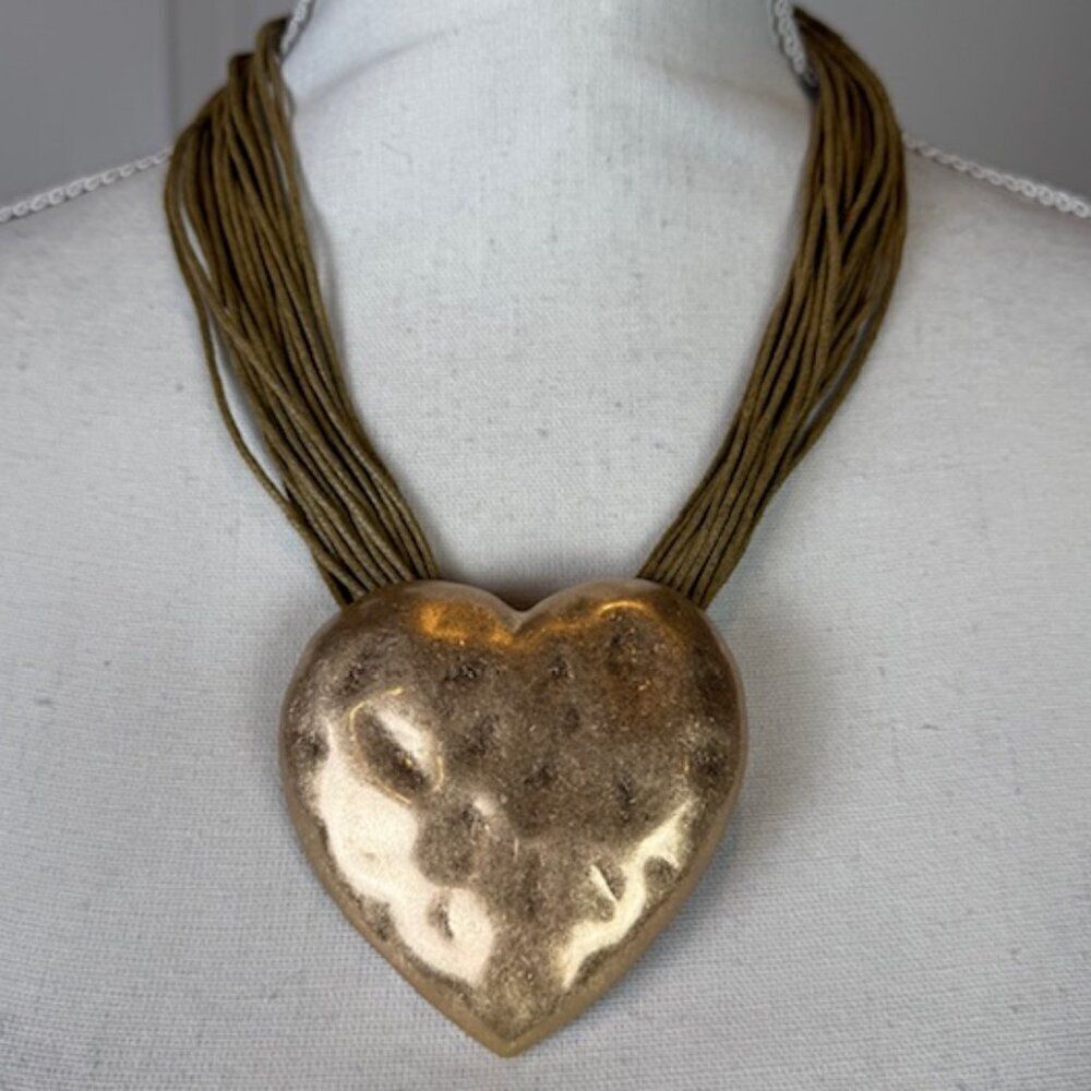 NWT Rustic Heart Necklace Hammered Gold Tone on cords. Aged gold tone